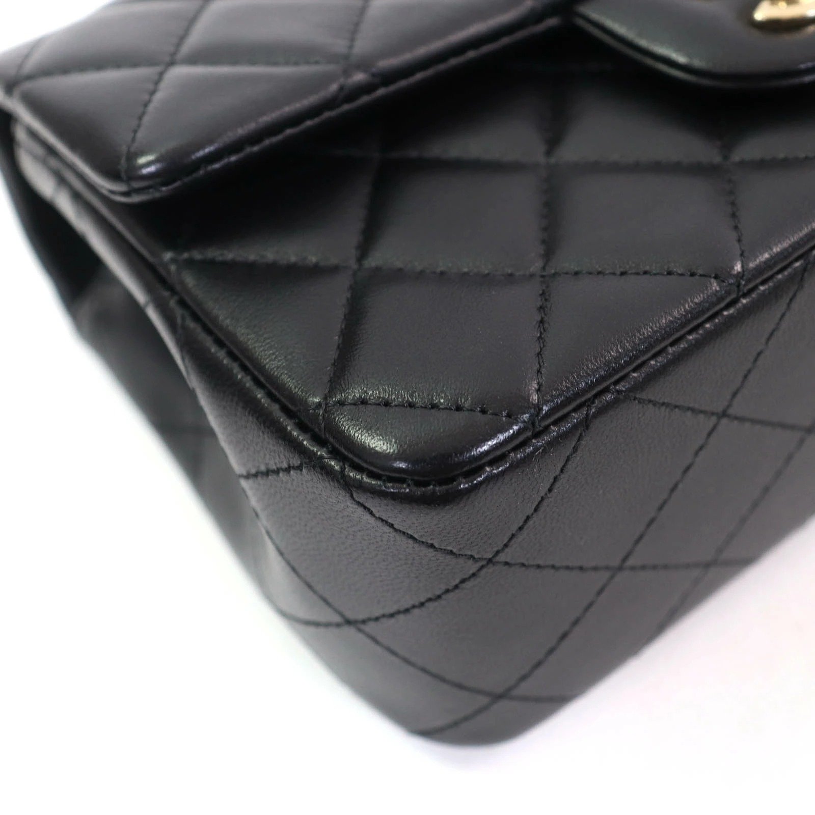 CHANEL Mini Black Lambskin Gold Hardware side view