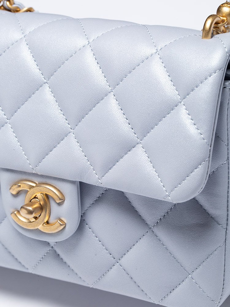 Chanel Mini Pearl Twist Light Blue Flap Bag skin detail
