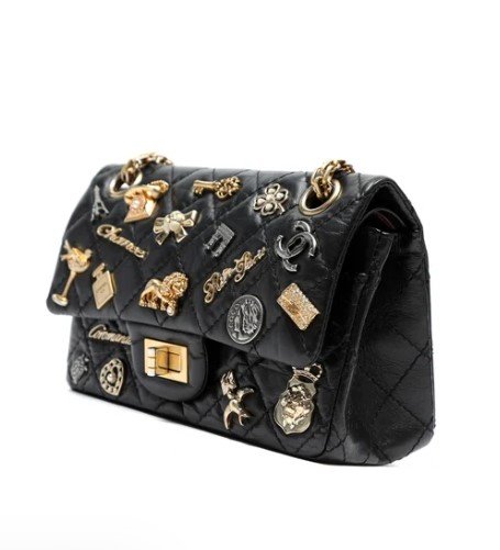 Chanel Reissue 2.55 Flap Bag Lucky Charms Gold Hardware side view 2